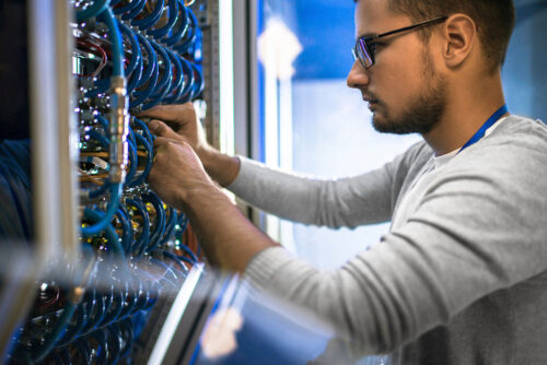 Person working on Cat6 cables
