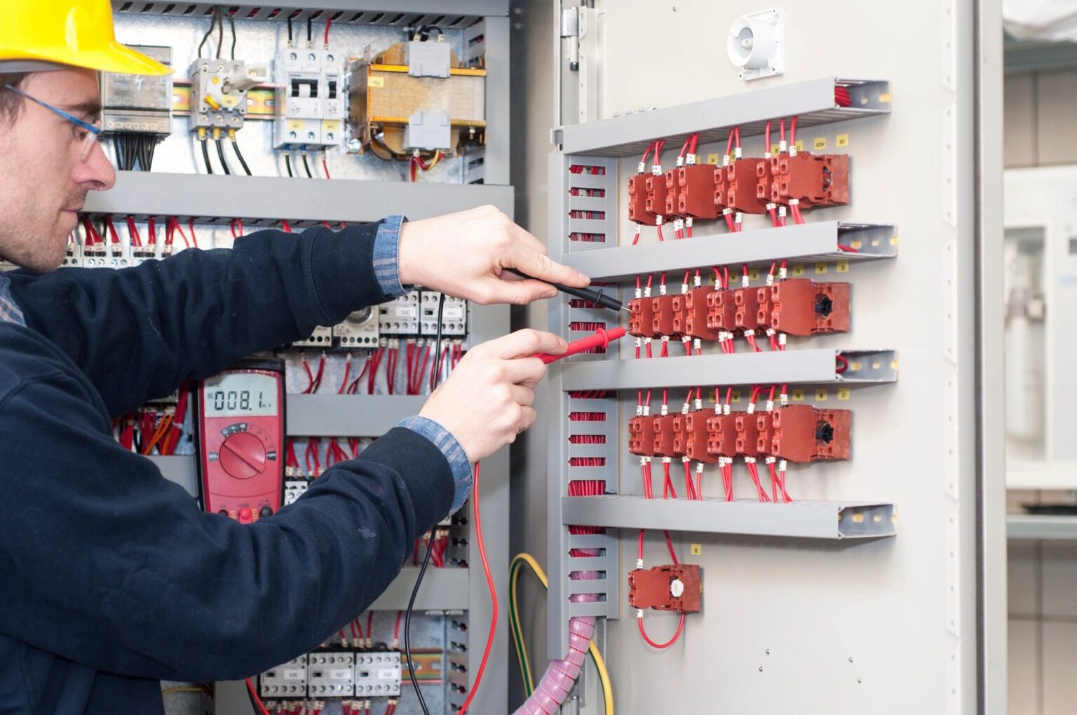 man working on cables