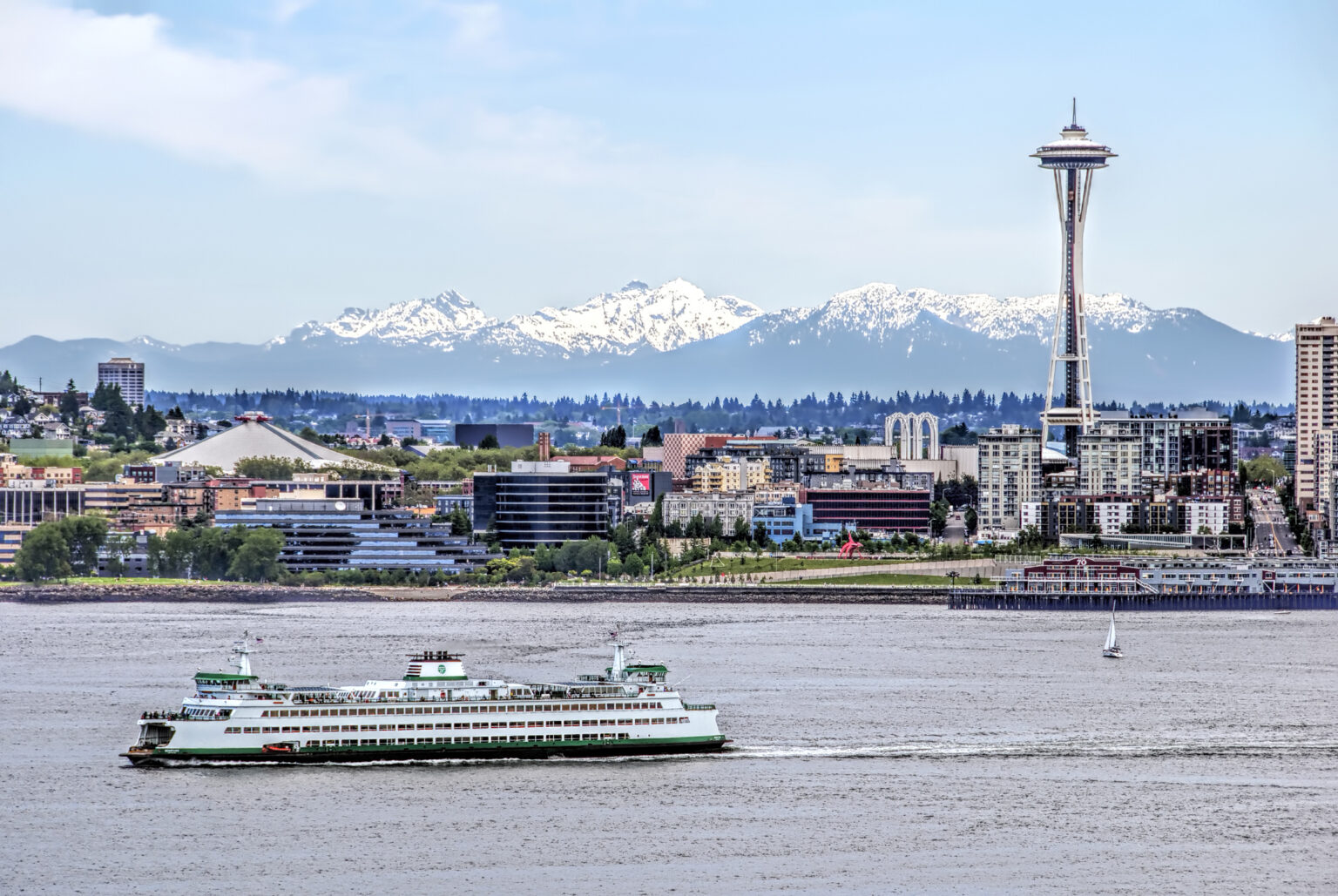 ferry with seattle in the background